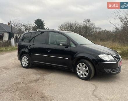 Черный Фольксваген Туран, объемом двигателя 1.4 л и пробегом 194 тыс. км за 6555 $, фото 98 на Automoto.ua