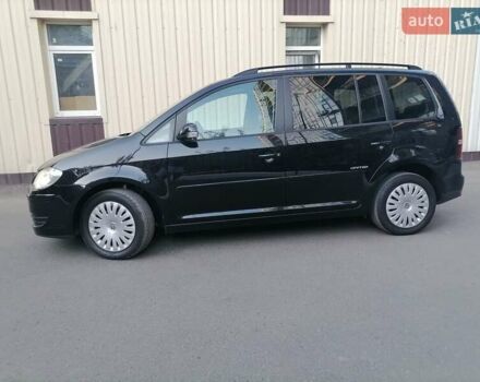 Черный Фольксваген Туран, объемом двигателя 1.4 л и пробегом 193 тыс. км за 6600 $, фото 3 на Automoto.ua