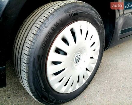 Черный Фольксваген Туран, объемом двигателя 1.4 л и пробегом 193 тыс. км за 6600 $, фото 13 на Automoto.ua