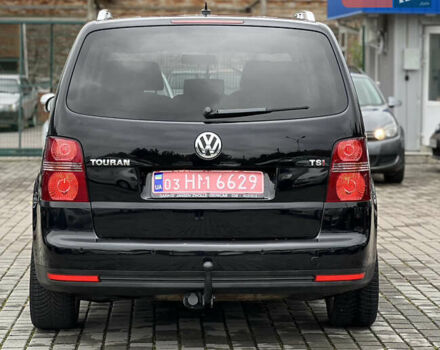 Черный Фольксваген Туран, объемом двигателя 1.4 л и пробегом 195 тыс. км за 7600 $, фото 5 на Automoto.ua