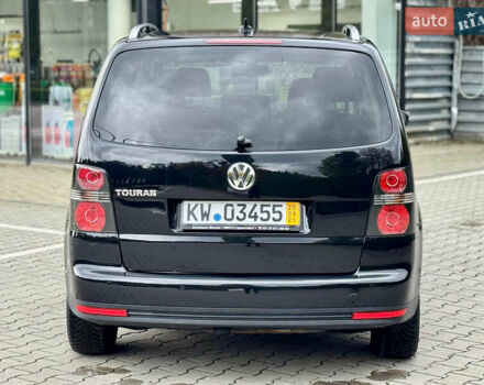 Черный Фольксваген Туран, объемом двигателя 1.4 л и пробегом 190 тыс. км за 7200 $, фото 7 на Automoto.ua