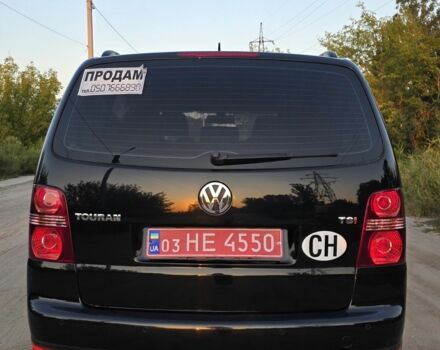 Черный Фольксваген Туран, объемом двигателя 1.4 л и пробегом 200 тыс. км за 6900 $, фото 2 на Automoto.ua