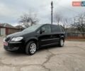 Черный Фольксваген Туран, объемом двигателя 1.4 л и пробегом 194 тыс. км за 6555 $, фото 74 на Automoto.ua