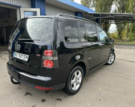 Черный Фольксваген Туран, объемом двигателя 1.4 л и пробегом 237 тыс. км за 6850 $, фото 5 на Automoto.ua