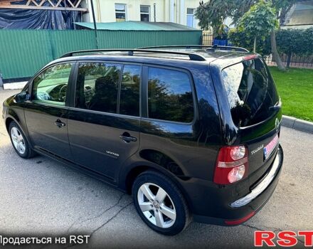 Черный Фольксваген Туран, объемом двигателя 1.6 л и пробегом 224 тыс. км за 8550 $, фото 3 на Automoto.ua