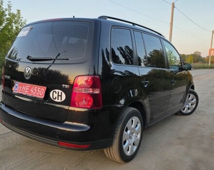 Черный Фольксваген Туран, объемом двигателя 1.4 л и пробегом 200 тыс. км за 6900 $, фото 5 на Automoto.ua