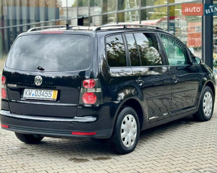 Черный Фольксваген Туран, объемом двигателя 1.4 л и пробегом 190 тыс. км за 7200 $, фото 8 на Automoto.ua