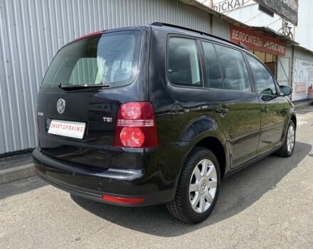 Черный Фольксваген Туран, объемом двигателя 1.4 л и пробегом 203 тыс. км за 6550 $, фото 2 на Automoto.ua