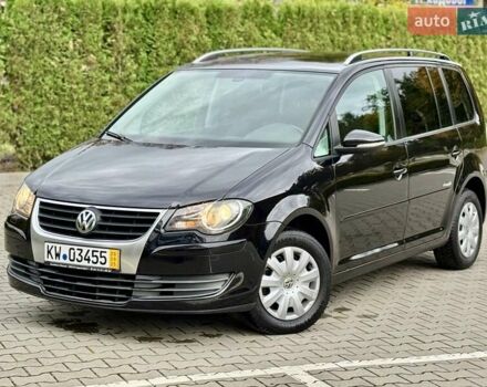 Чорний Фольксваген Туран, об'ємом двигуна 1.4 л та пробігом 190 тис. км за 6950 $, фото 1 на Automoto.ua