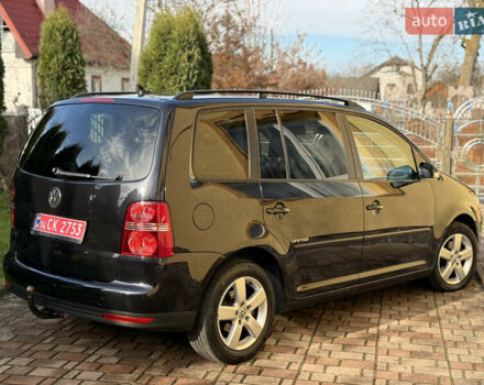 Чорний Фольксваген Туран, об'ємом двигуна 1.4 л та пробігом 148 тис. км за 5999 $, фото 29 на Automoto.ua