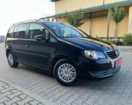 Черный Фольксваген Туран, объемом двигателя 1.6 л и пробегом 240 тыс. км за 8100 $, фото 1 на Automoto.ua