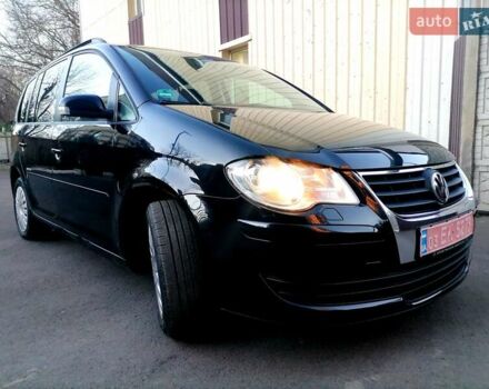 Черный Фольксваген Туран, объемом двигателя 1.4 л и пробегом 193 тыс. км за 6600 $, фото 18 на Automoto.ua