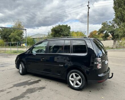 Черный Фольксваген Туран, объемом двигателя 1.4 л и пробегом 237 тыс. км за 6850 $, фото 2 на Automoto.ua