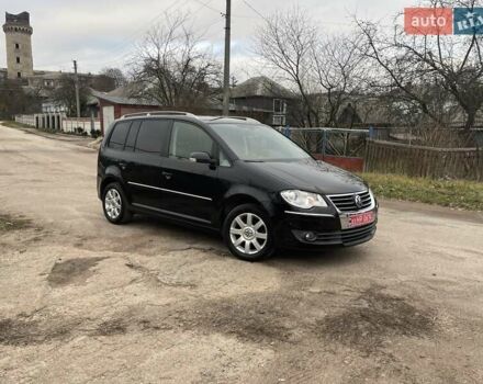 Черный Фольксваген Туран, объемом двигателя 1.4 л и пробегом 194 тыс. км за 6555 $, фото 4 на Automoto.ua
