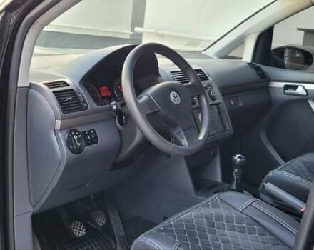Черный Фольксваген Туран, объемом двигателя 1.97 л и пробегом 248 тыс. км за 8300 $, фото 20 на Automoto.ua