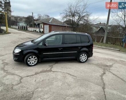Черный Фольксваген Туран, объемом двигателя 1.4 л и пробегом 194 тыс. км за 6555 $, фото 32 на Automoto.ua