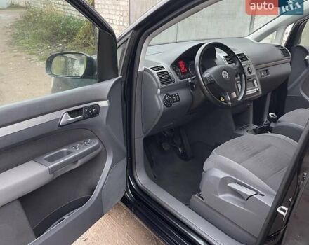 Черный Фольксваген Туран, объемом двигателя 1.4 л и пробегом 194 тыс. км за 6555 $, фото 37 на Automoto.ua