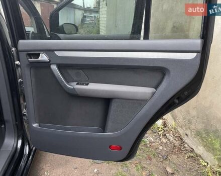 Черный Фольксваген Туран, объемом двигателя 1.4 л и пробегом 194 тыс. км за 6555 $, фото 134 на Automoto.ua