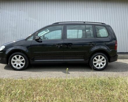 Черный Фольксваген Туран, объемом двигателя 1.4 л и пробегом 203 тыс. км за 6550 $, фото 5 на Automoto.ua