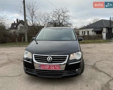 Черный Фольксваген Туран, объемом двигателя 1.4 л и пробегом 194 тыс. км за 6555 $, фото 77 на Automoto.ua