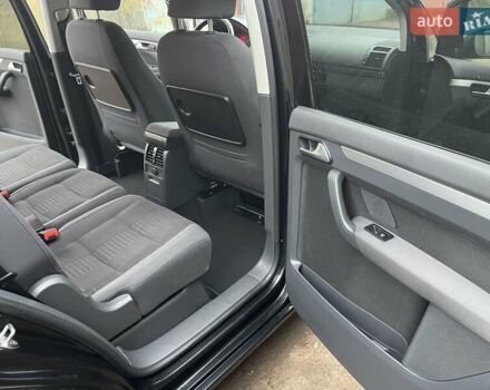 Черный Фольксваген Туран, объемом двигателя 1.4 л и пробегом 194 тыс. км за 6555 $, фото 135 на Automoto.ua