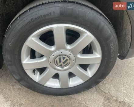 Черный Фольксваген Туран, объемом двигателя 1.4 л и пробегом 194 тыс. км за 6555 $, фото 24 на Automoto.ua