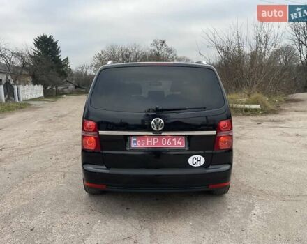 Черный Фольксваген Туран, объемом двигателя 1.4 л и пробегом 194 тыс. км за 6555 $, фото 104 на Automoto.ua