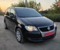 Черный Фольксваген Туран, объемом двигателя 1.4 л и пробегом 194 тыс. км за 7600 $, фото 1 на Automoto.ua