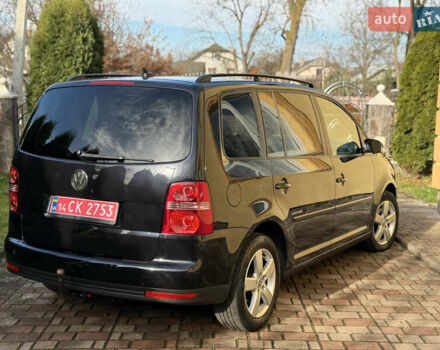 Чорний Фольксваген Туран, об'ємом двигуна 1.4 л та пробігом 148 тис. км за 5999 $, фото 27 на Automoto.ua