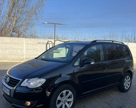 Черный Фольксваген Туран, объемом двигателя 1.9 л и пробегом 353 тыс. км за 6699 $, фото 3 на Automoto.ua