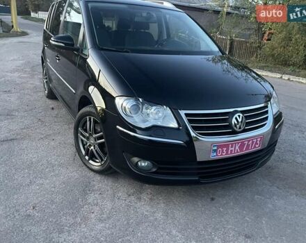 Черный Фольксваген Туран, объемом двигателя 1.4 л и пробегом 238 тыс. км за 7888 $, фото 194 на Automoto.ua
