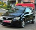 Черный Фольксваген Туран, объемом двигателя 1.4 л и пробегом 189 тыс. км за 6900 $, фото 1 на Automoto.ua