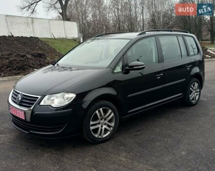 Черный Фольксваген Туран, объемом двигателя 1.6 л и пробегом 249 тыс. км за 7999 $, фото 6 на Automoto.ua