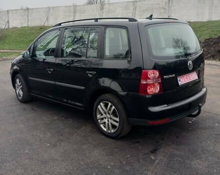 Черный Фольксваген Туран, объемом двигателя 1.6 л и пробегом 249 тыс. км за 7999 $, фото 14 на Automoto.ua