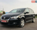 Черный Фольксваген Туран, объемом двигателя 2 л и пробегом 206 тыс. км за 9999 $, фото 1 на Automoto.ua