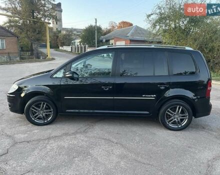 Черный Фольксваген Туран, объемом двигателя 1.4 л и пробегом 238 тыс. км за 7888 $, фото 85 на Automoto.ua