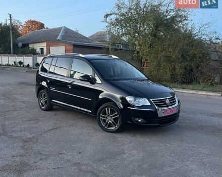 Черный Фольксваген Туран, объемом двигателя 1.4 л и пробегом 238 тыс. км за 7888 $, фото 197 на Automoto.ua