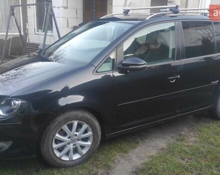 Черный Фольксваген Туран, объемом двигателя 1.39 л и пробегом 207 тыс. км за 7788 $, фото 3 на Automoto.ua
