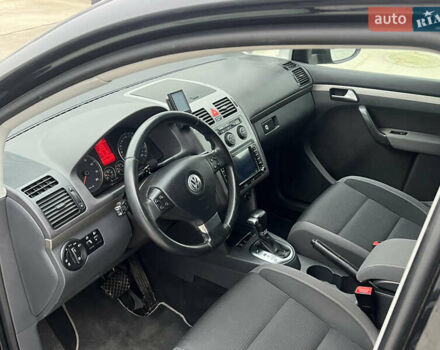 Черный Фольксваген Туран, объемом двигателя 1.4 л и пробегом 213 тыс. км за 8100 $, фото 46 на Automoto.ua
