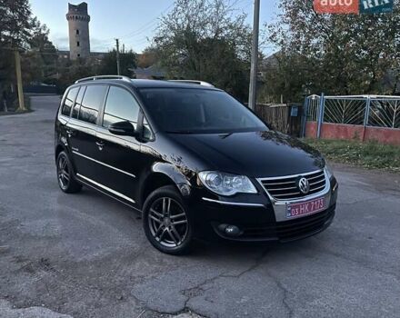 Черный Фольксваген Туран, объемом двигателя 1.4 л и пробегом 238 тыс. км за 7888 $, фото 4 на Automoto.ua