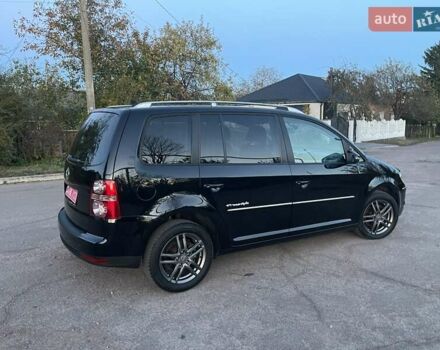 Черный Фольксваген Туран, объемом двигателя 1.4 л и пробегом 238 тыс. км за 7888 $, фото 201 на Automoto.ua