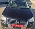Черный Фольксваген Туран, объемом двигателя 1.4 л и пробегом 197 тыс. км за 8600 $, фото 2 на Automoto.ua