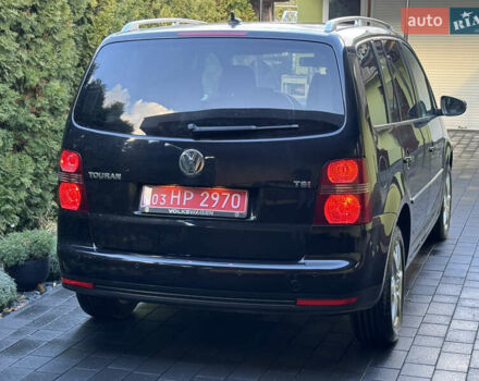Черный Фольксваген Туран, объемом двигателя 1.4 л и пробегом 199 тыс. км за 7999 $, фото 5 на Automoto.ua