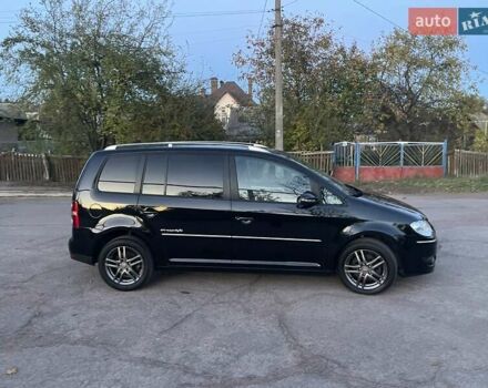 Черный Фольксваген Туран, объемом двигателя 1.4 л и пробегом 238 тыс. км за 7888 $, фото 199 на Automoto.ua
