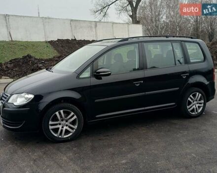 Черный Фольксваген Туран, объемом двигателя 1.6 л и пробегом 249 тыс. км за 7999 $, фото 8 на Automoto.ua