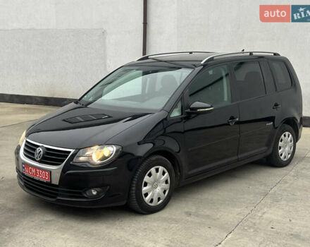 Черный Фольксваген Туран, объемом двигателя 1.4 л и пробегом 213 тыс. км за 8100 $, фото 88 на Automoto.ua