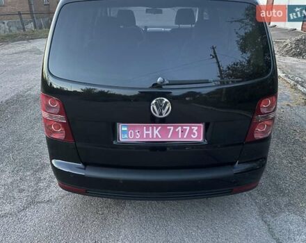 Черный Фольксваген Туран, объемом двигателя 1.4 л и пробегом 238 тыс. км за 7888 $, фото 218 на Automoto.ua