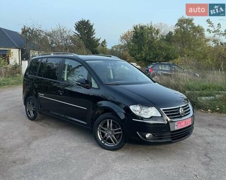 Черный Фольксваген Туран, объемом двигателя 1.4 л и пробегом 238 тыс. км за 7888 $, фото 89 на Automoto.ua