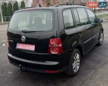 Черный Фольксваген Туран, объемом двигателя 1.6 л и пробегом 249 тыс. км за 7999 $, фото 19 на Automoto.ua
