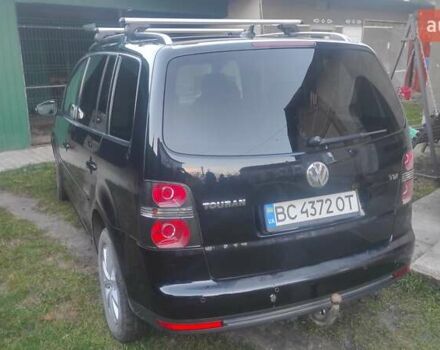 Черный Фольксваген Туран, объемом двигателя 1.39 л и пробегом 207 тыс. км за 7788 $, фото 5 на Automoto.ua
